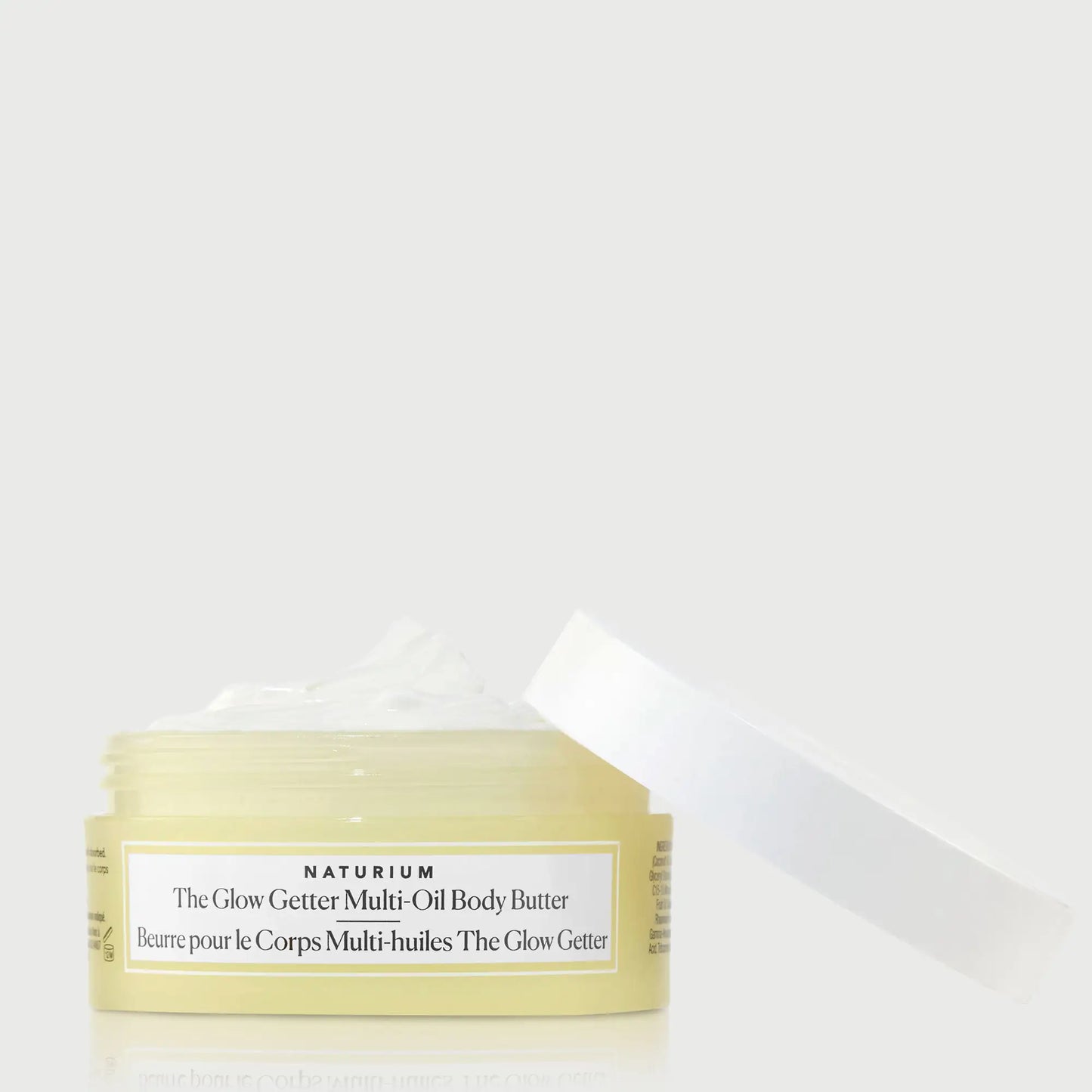the-glow-getter-multi-oil-body-butter-travel-size-y7 NATR-40115_Glow-Getter-Body-Butter-Mini_front_capoff_bonebkgd.webp