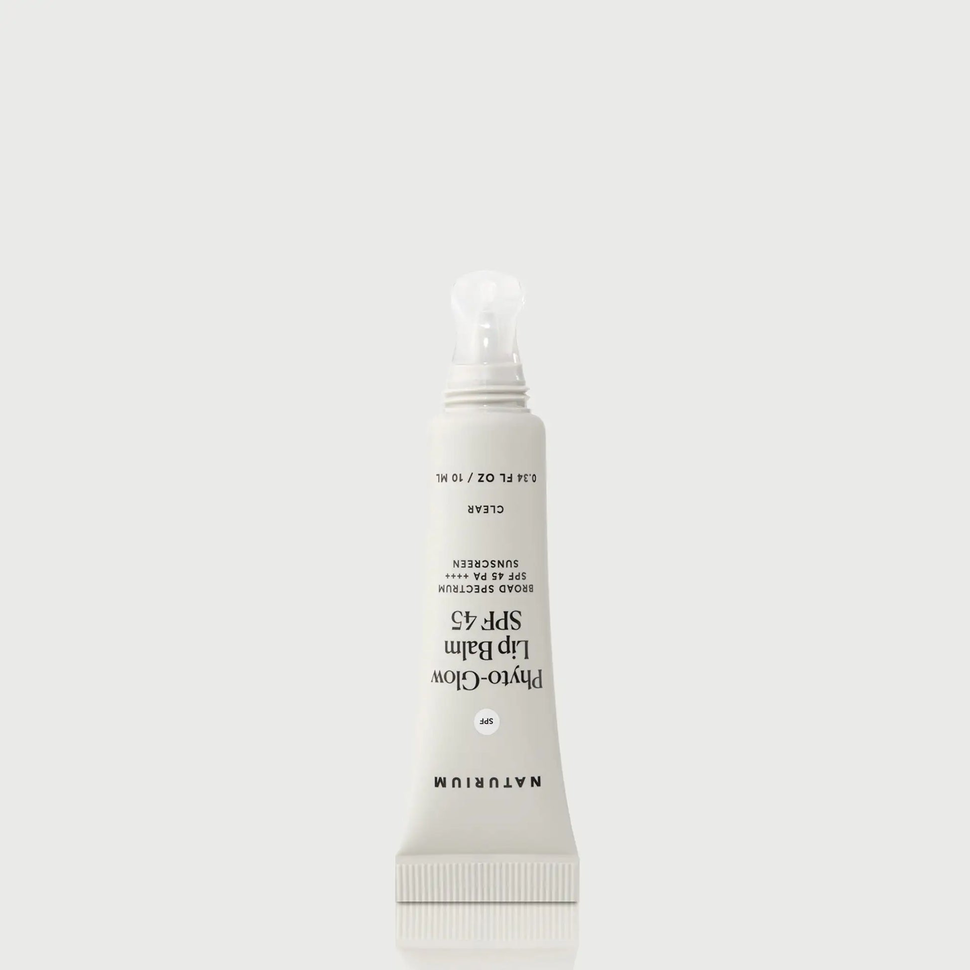 phyto-glow-lip-balm-spf-45-clear-h1 NATR-10124_PhytoGlow_SPF_Clear_primary_nocap_bonebkgd_1.webp