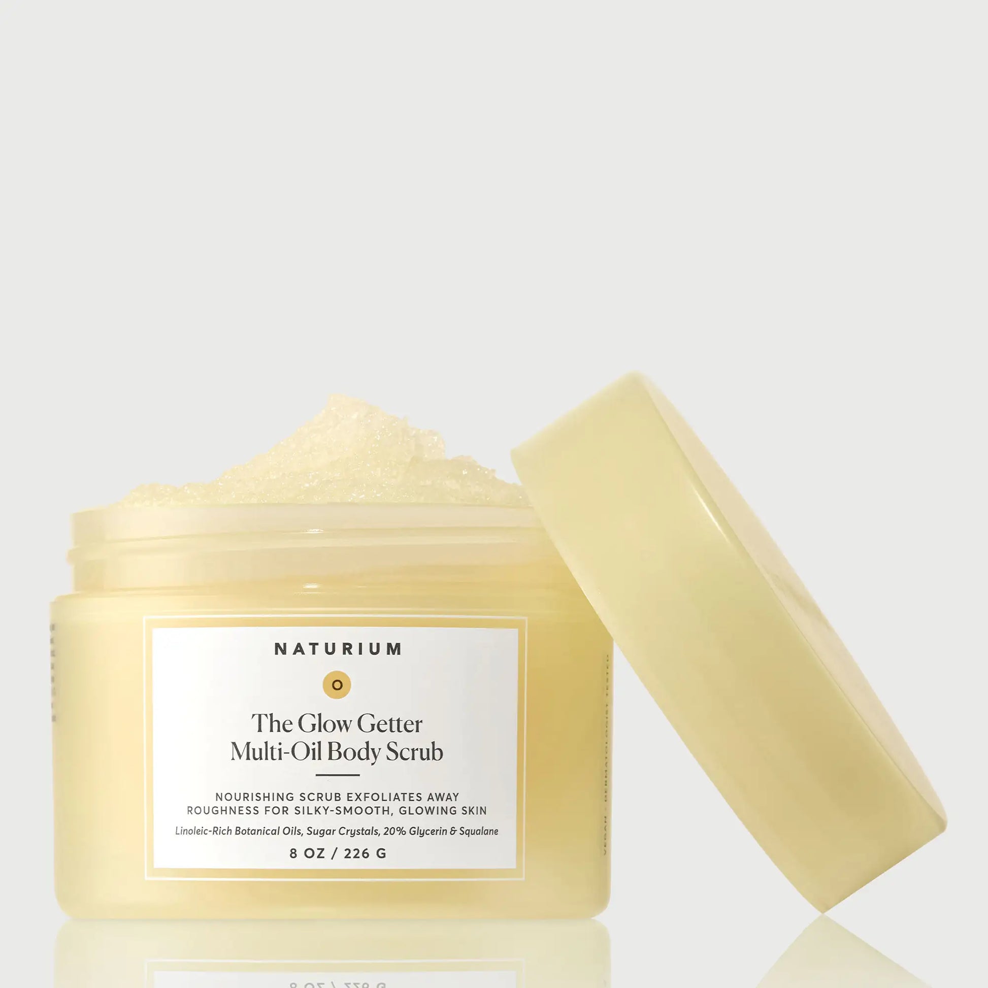 the-glow-getter-multi-oil-body-scrub-x2 NATR-40028-GlowGetter-Multi-Oil-Body-Scrub-Front-CapOff-bonebkgd.webp