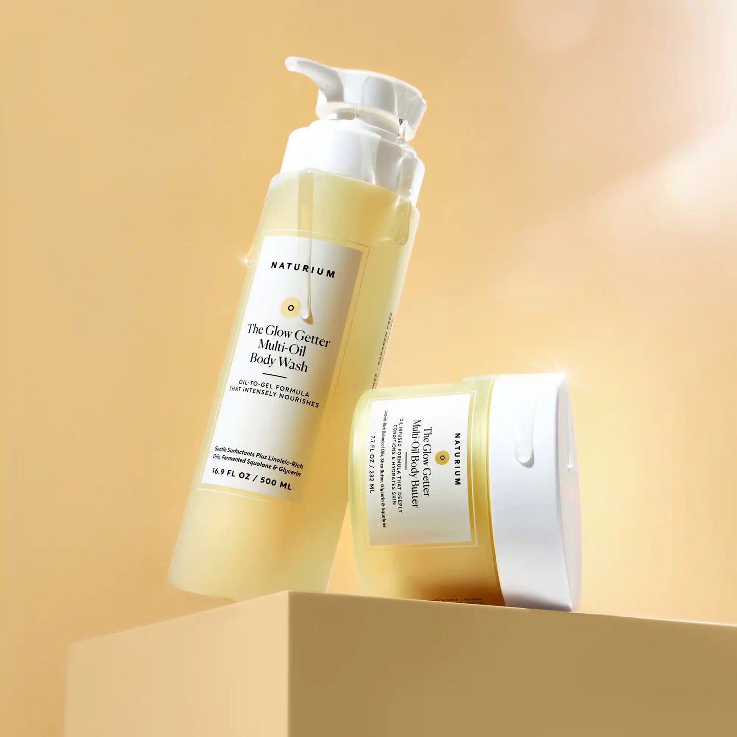 the-glow-all-out-body-bundle-a7 gg-bodybutter_1464-crop_revcolor_FL.webp